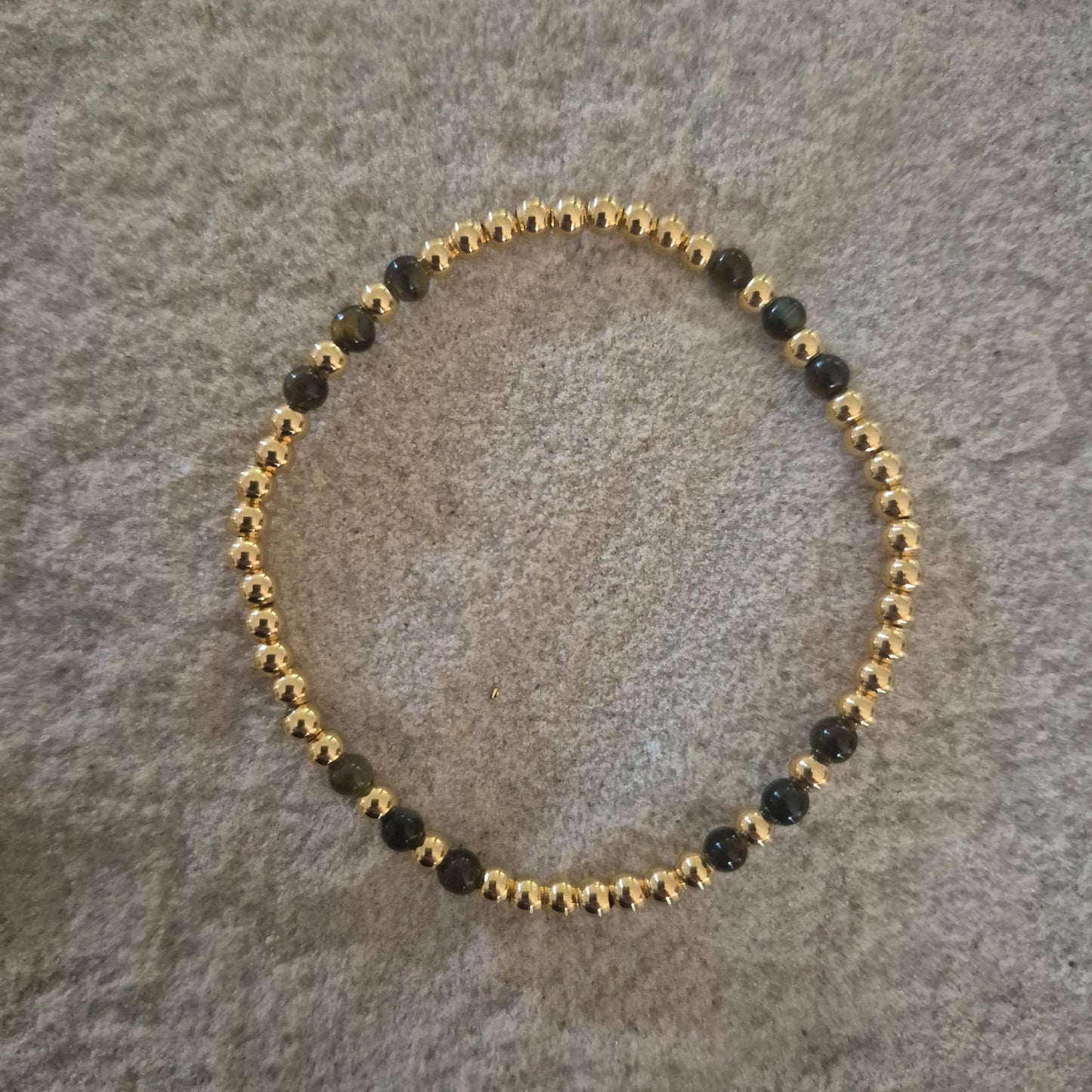 Pulsera Goldfilled y piedra ojo de tigre