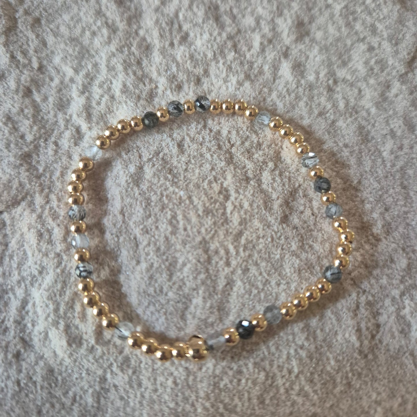 Pulsera Goldfilled y piedra Cuarzo